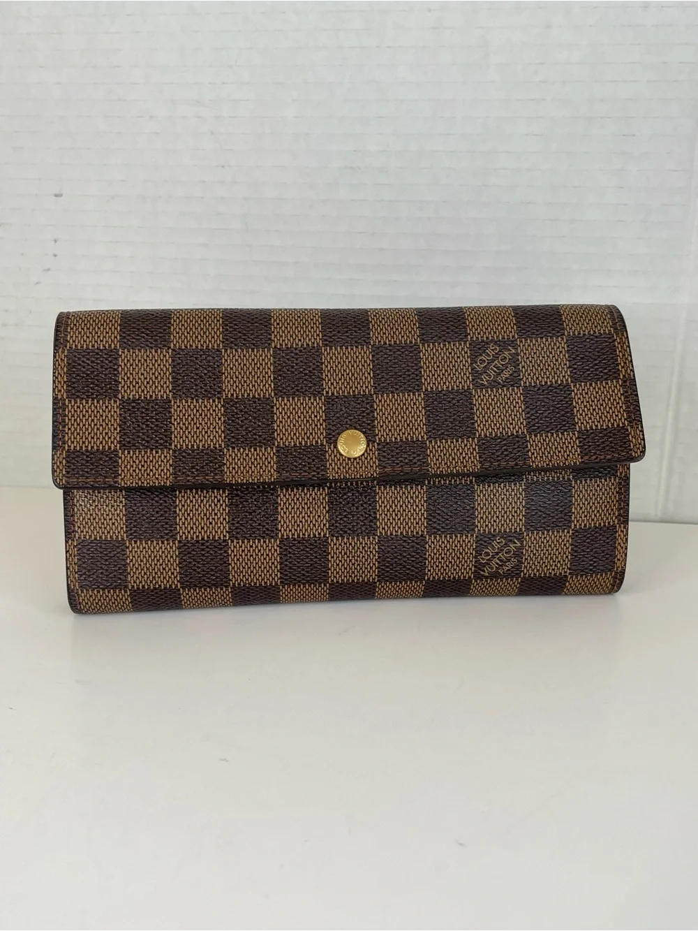 Louis Vuitton Sarah Wallet in Damier Ebene canvas